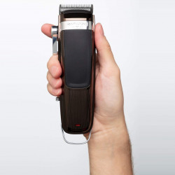 Remington HC9100 Hair Clipper, 1.5–25 mm Comb Attachments, Steel-Coated Blades, 60-Minute Run Time, Gray