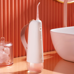 Fogászati zuhany Oclean W10, 5 üzemmód, 2 fúvóka, 200 ml, 1400 impulzus percenként, IPX7, USB-C, rózsaszínű