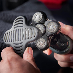 Самобръсначка за глава Remington RX7 XR1600 Ultimate Series, Автономия 60 мин, Водоустойчив, Подвижна глава, Турбо, Стоманени остриета, Индикатори, Черен/зелен