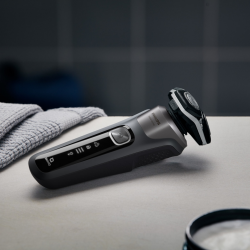 Ηλεκτρική ξυριστική μηχανή Philips Shaver Series 5000 S5887/10, 9 W, 60 λεπτά, Χρήση σε στεγνό ή βρεγμένο δέρμα, Ενσωματωμένο τρίμερ, SkinIQ, PowerAdapt, Κεφαλές 360°, Αυτοακονιζόμενες λεπίδες, Γκρι