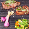 Gastroback Advanced Pro 42523 elektromos grill mozgatható lapokkal, 2300 W, 50×30 cm, 90–240 °C, sima/bordázott, tapadásmentes, zsírfogó tálca, fekete/rozsdamentes acél