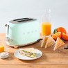 SMEG 50's Style TSF01PGEU kenyérpirító, 950 W, 2 szelet, 6 fokozat, morzsatartó, beépített kábel, rozsdamentes acél, zöld