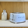 Τοστιέρα SMEG 50's Style TSF03PBEU, 2000 W, 4 φέτες, 6 επίπεδα, Δίσκος για ψίχουλα, Ενσωματωμένο καλώδιο, Ανοξείδωτο ατσάλι, Μπλε